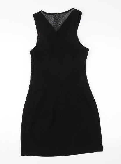Back view of Silence + Noise women’s black mini, size S