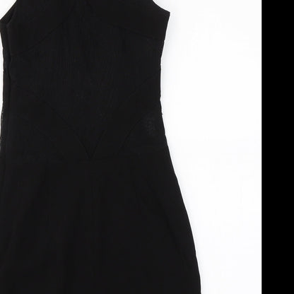 Brand and care label for Silence + Noise women’s black mini, size S