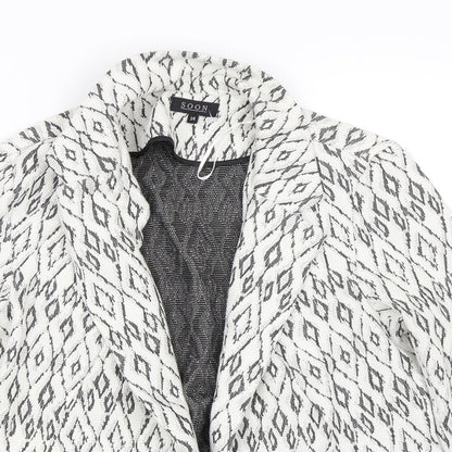 Close-up detail of Soon women’s white argyle/diamond jacket, size UK 14