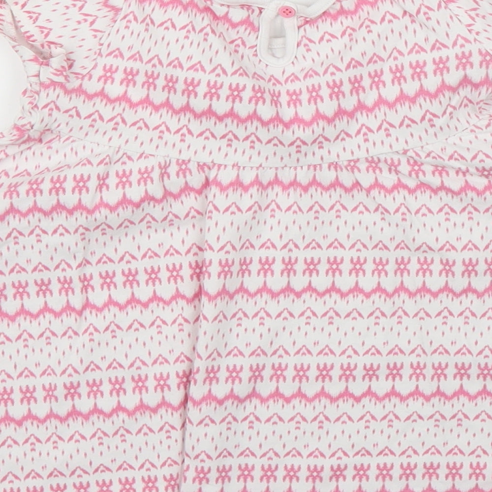 Brand and care label for F&F girls’ pink geometric a-line, size 18-24, months