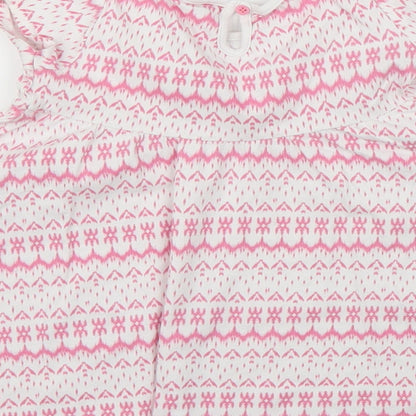 Brand and care label for F&F girls’ pink geometric a-line, size 18-24, months