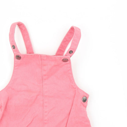 Close-up detail of F&F girls’ pink denim a-line, size 9-12, months