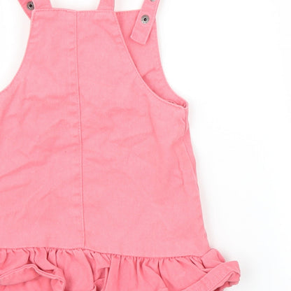 Brand and care label for F&F girls’ pink denim a-line, size 9-12, months