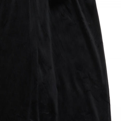Close-up detail of Canda women’s black sweatpants, size UK 16, 25-inch leg