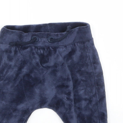 Close-up detail of Tu boys’ blue capri trousers, size 3-6, months