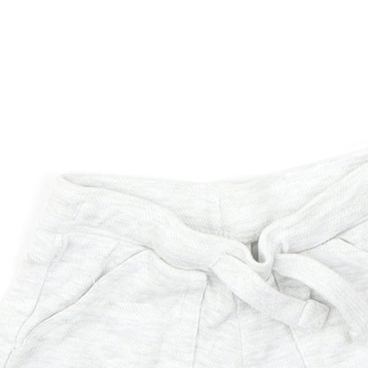 Close-up detail of F&F boys’ grey capri leggings, size 3-6, months