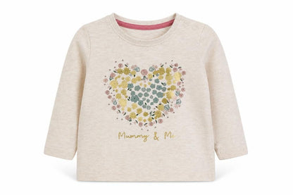 Front view of Primark girls’ beige basic t-shirt, size 6-9, months