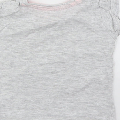 Brand and care label for Primark girls’ grey basic t-shirt, size 6-9, months