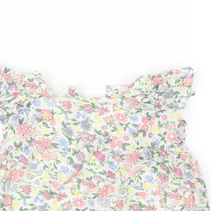 Close-up detail of Primark Baby White Floral Shift, size 12-18, Months