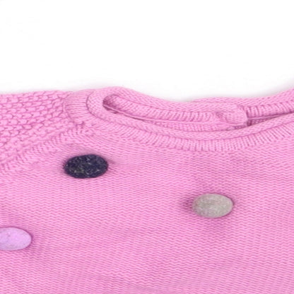 Close-up detail of Nutmeg girls’ pink jumper, size 3-6, months