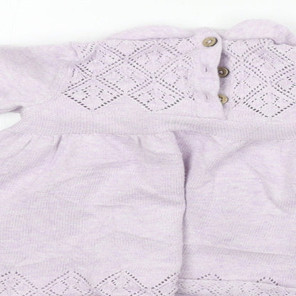 Brand and care label for Tu girls’ pink a-line, size 0-3, months