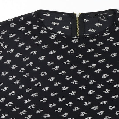 Close-up detail of Atmosphere women’s black geometric basic blouse, size UK 10