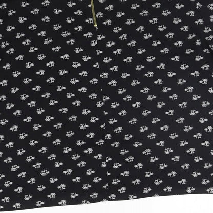 Brand and care label for Atmosphere women’s black geometric basic blouse, size UK 10