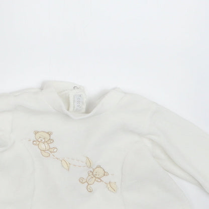 Close-up detail of COCO girls’ white a-line, size 3-6, months