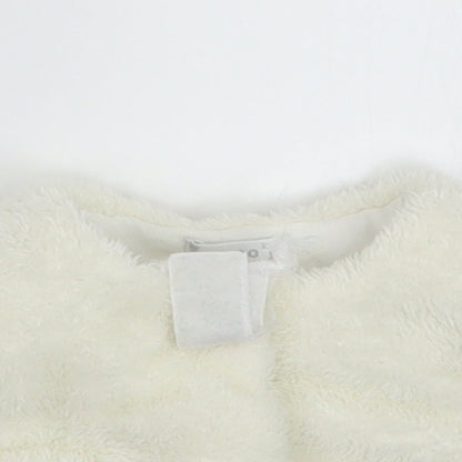Close-up detail of COCO girls’ white jacket, size 3-6, months