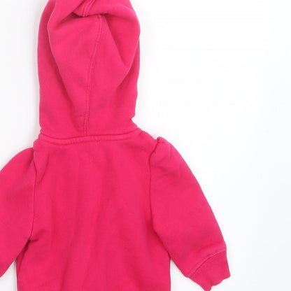 Brand and care label for Gap girls’ pink jacket, size 3-6, months