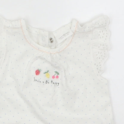 Close-up detail of Next girls’ white polka dot basic t-shirt, size 0-3, months - smile & be happy