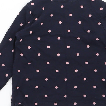 Brand and care label for H&M girls’ blue polka dot basic t-shirt, size 6-9, months