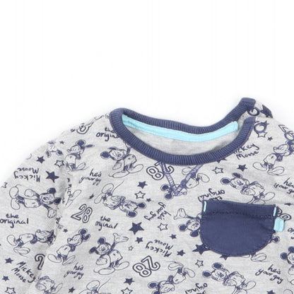 Close-up detail of Asda George boys’ multicoloured geometric jumper, size 0-3, months - disney