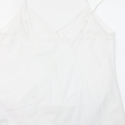 Brand and care label for ASOS women’s white basic blouse, size UK 18