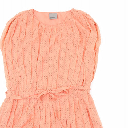Close-up detail of Vera Moda women’s orange polka dot fit & flare, size S