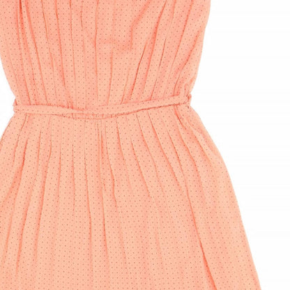Brand and care label for Vera Moda women’s orange polka dot fit & flare, size S