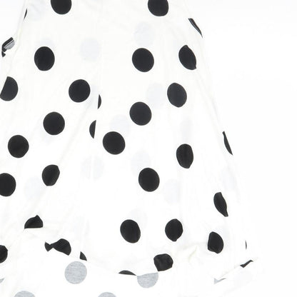 Brand and care label for ASOS women’s white polka dot basic tank, size UK 8