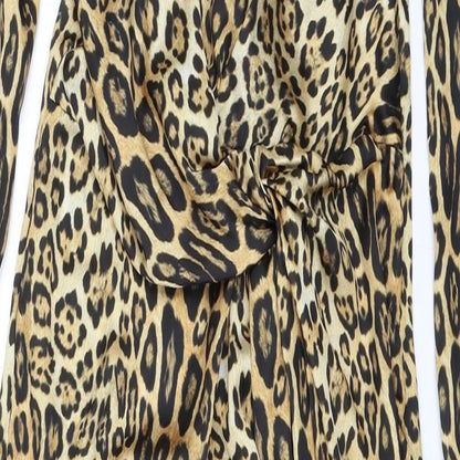 Close-up detail of Missguided women’s gold animal print shift, size UK 4
