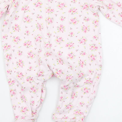 Brand and care label for Bebe Bonito girls’ pink floral babygrow one-piece, size 3-6, months