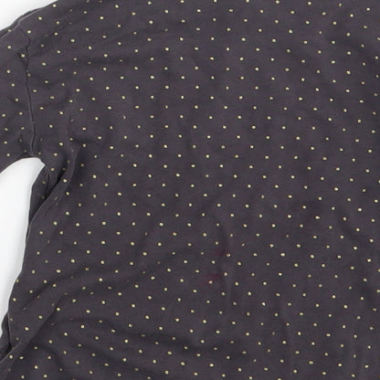 Brand and care label for H&M girls’ grey polka dot pullover t-shirt, size 4-5, years