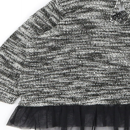Brand and care label for Disney girls’ grey jumper, size 3-6, months