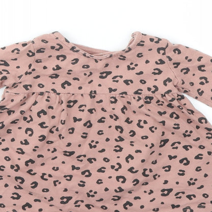 Brand and care label for F&F girls’ pink animal print basic t-shirt, size 0-3, months