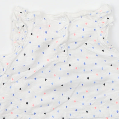 Brand and care label for F&F girls’ multicoloured spotted basic t-shirt, size 0-3, months