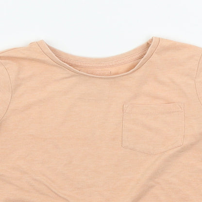 Close-up detail of F&F girls’ orange basic t-shirt, size 3-4, years