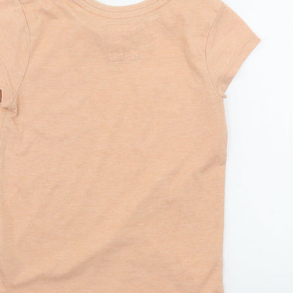 Brand and care label for F&F girls’ orange basic t-shirt, size 3-4, years