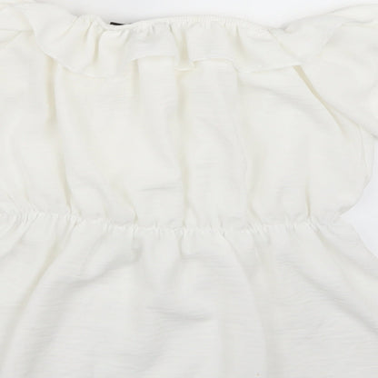 Brand and care label for I SAW IT FIRST women’s white basic blouse, size UK 8