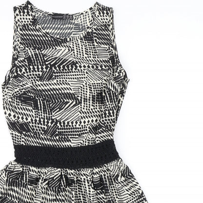 Close-up detail of Atmosphere women’s black animal print shift, size UK 6