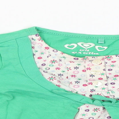 Close-up detail of George girls’ green jumper, size 9-12, months