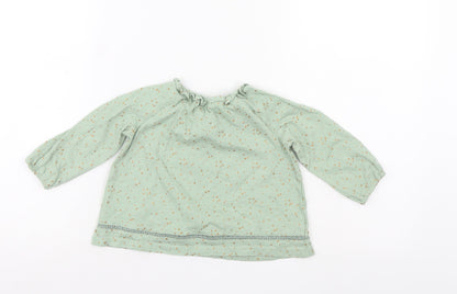 Back view of Next girls’ green polka dot a-line, size 9-12, months