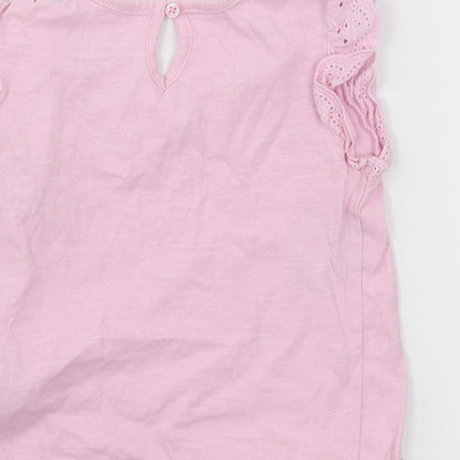 Brand and care label for Primark girls’ pink jersey basic t-shirt, size 18-24, months