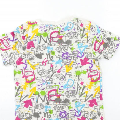 Brand and care label for Nutmeg girls’ white geometric basic t-shirt, size 9-10, years