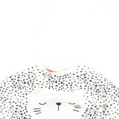 Close-up detail of F&F girls’ white polka dot jumper, size 6-9, months