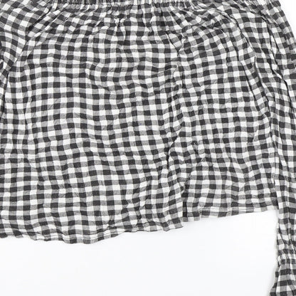 Brand and care label for Atmosphere women’s black plaid basic blouse, size UK 8