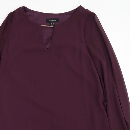 Close-up detail of Atmosphere women’s purple basic blouse, size UK 10