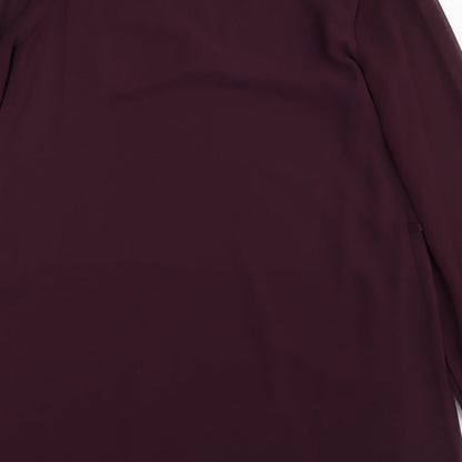 Brand and care label for Atmosphere women’s purple basic blouse, size UK 10