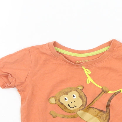Close-up detail of Primark girls’ orange basic t-shirt, size 18-24, months - monkey