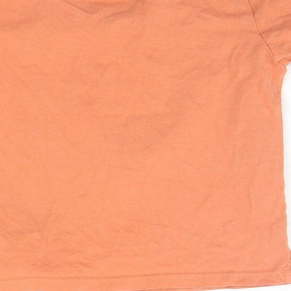 Brand and care label for Primark girls’ orange basic t-shirt, size 18-24, months - monkey