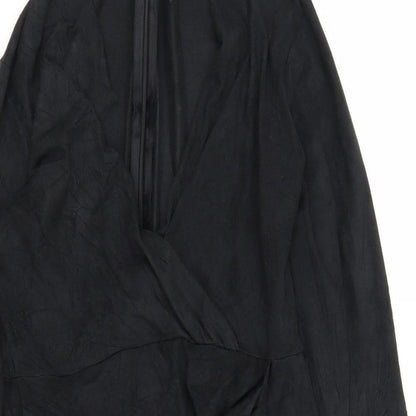 Close-up detail of Missguided women’s black wrap dress, size UK 10