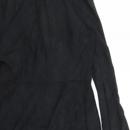 Brand and care label for Missguided women’s black wrap dress, size UK 10