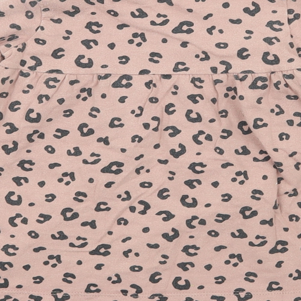 Brand and care label for F&F girls’ pink animal print jersey t-shirt dress, size 3-6, months